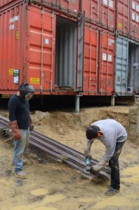 Men of steel build home