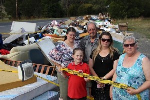 Rubbish rots over red tape