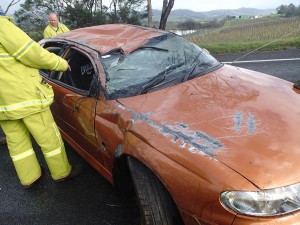 Car flips, narrow escape