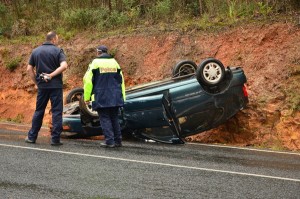 Car flips at Black Spur