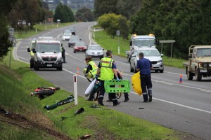 Rider hospitalised after crash with car
