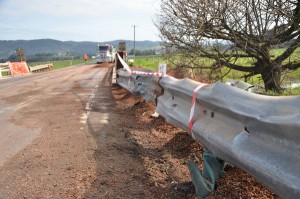 Flipped truck blocks highway