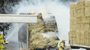 Hay fire causes havoc on highway