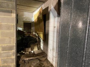 Two car accident causes driver to smash through house in Launching Place