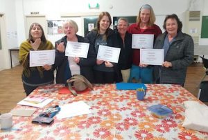 Locals learning Auslan for the hearing impaired in the community