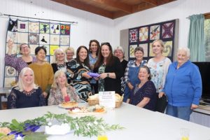 Lovcal women share food and friendship at potluck
