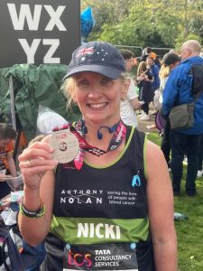 Local swim teacher runs London marathon for charity