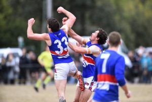 Doggies prevail in wintery conditions