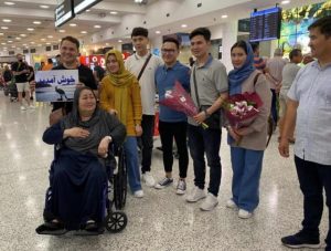 Refugee reunites with family