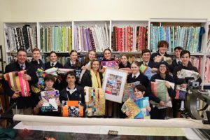 Quilts for Orphans help students deliver a quilted hug in Thailand