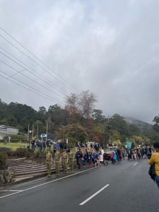 Warburton marches through the street for Anzac Day