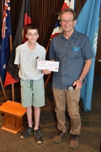 Wandin North student Jake gives $1016 to Wandin Rotary