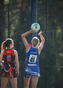 Burras battle through windy conditions to claim victory