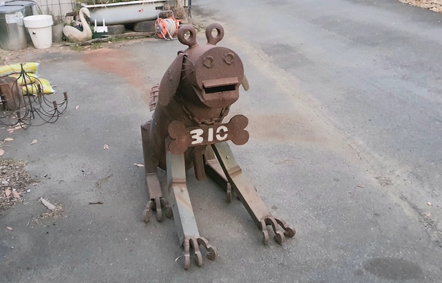 Owner reunites with iconic metal dog letterbox