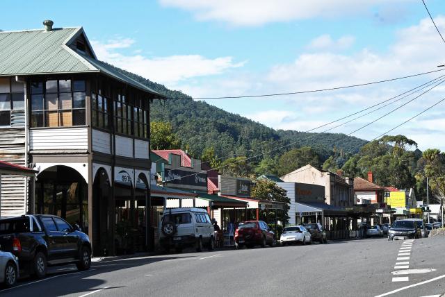 Car toppled in Warby main street crash